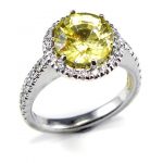 Round Yellow Sapphire with claw set diamond halo and claw set shoulder diamonds