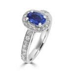 Oval Ceylon Sapphire & Pave set Diamond Halo and Shoulder Diamonds