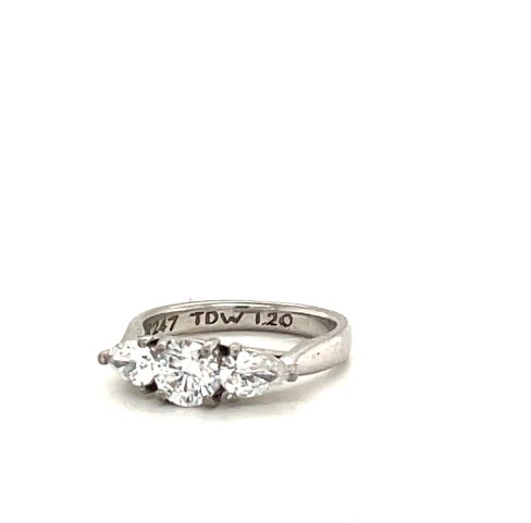 Three stone engagement ring with beautiful brilliant cut diamonds and engraving