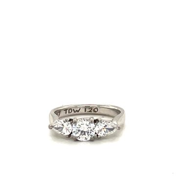 Three stone engagement ring with beautiful brilliant cut diamonds