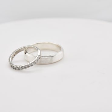 white gold with diamond bezel inside the ring, wedding bands