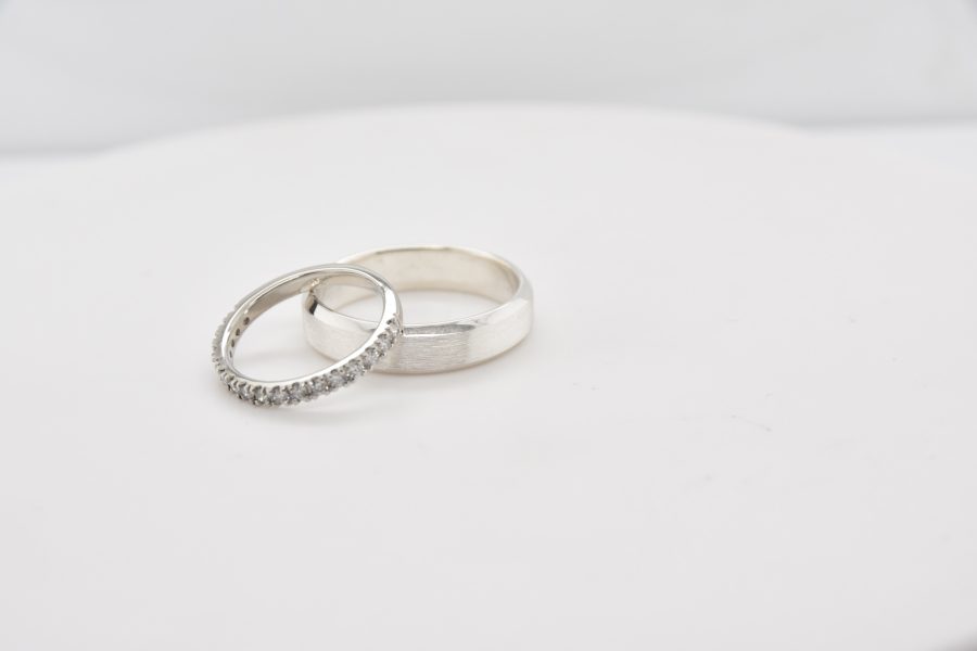 white gold with diamond bezel inside the ring, wedding bands