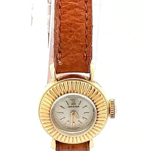 omega watch, brown letter strap, gold