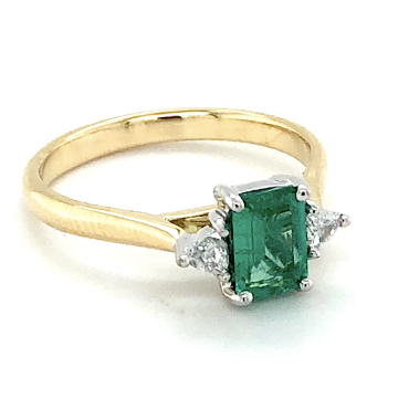 Emerald and Round Brilliant Cut Diamond Side Stones Ring