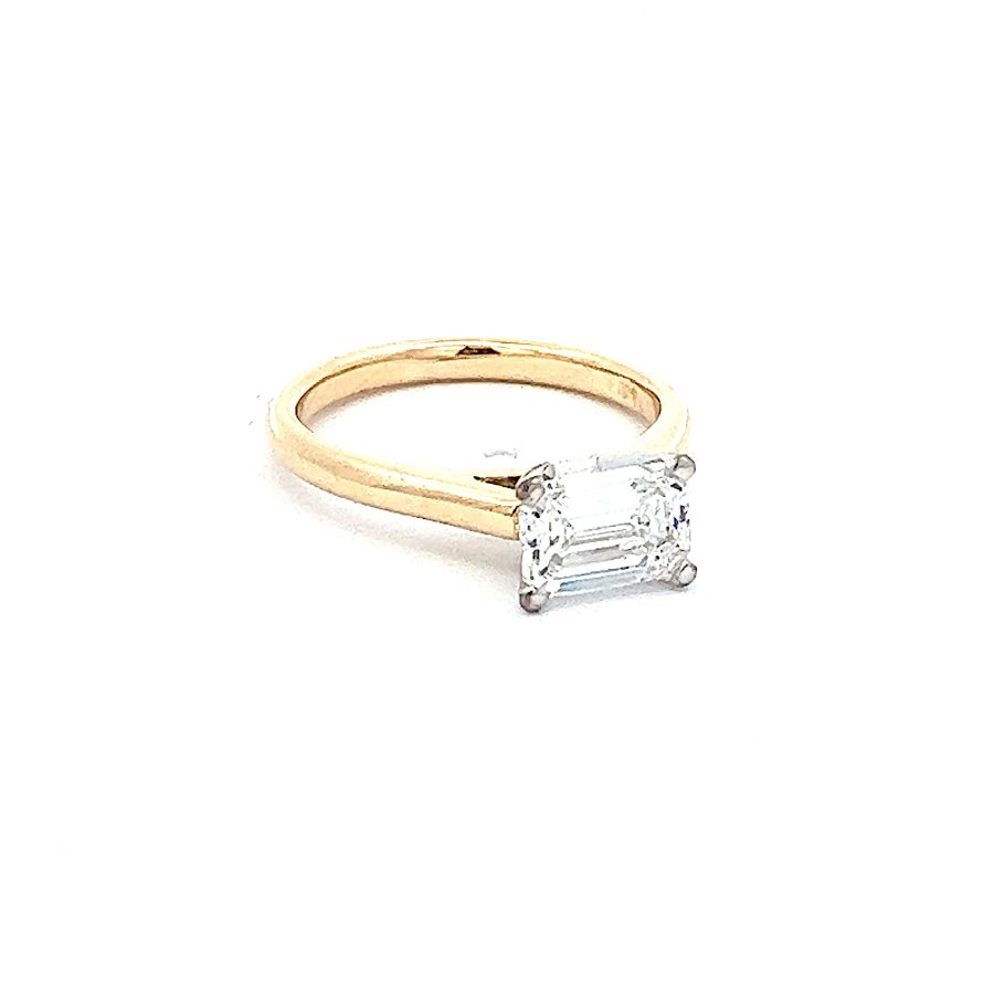 Yellow Gold, long radiant cut diamond engagement ring