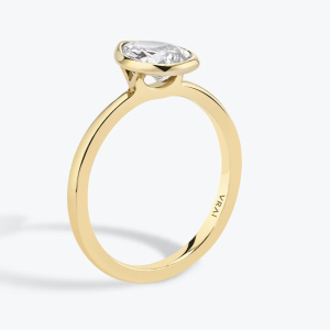 The Signature Bezel Pear engagement ring