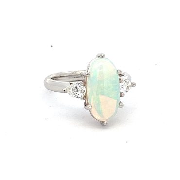 Tapered Shank Oval Opal Ring with Trio Diamond Accent On White Gold Band